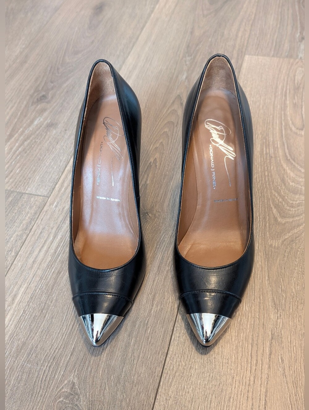 Donald J. Pliner Black Leather Pointed Pumps with Silver Caps